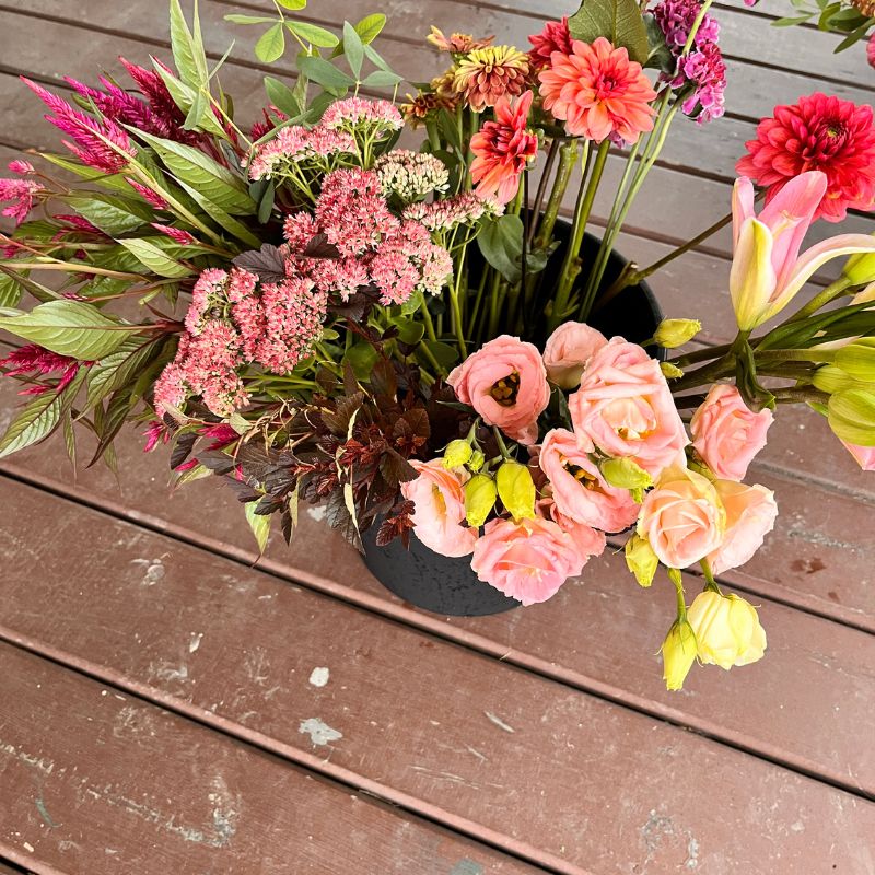 Bulk wedding flowers gathered for brides